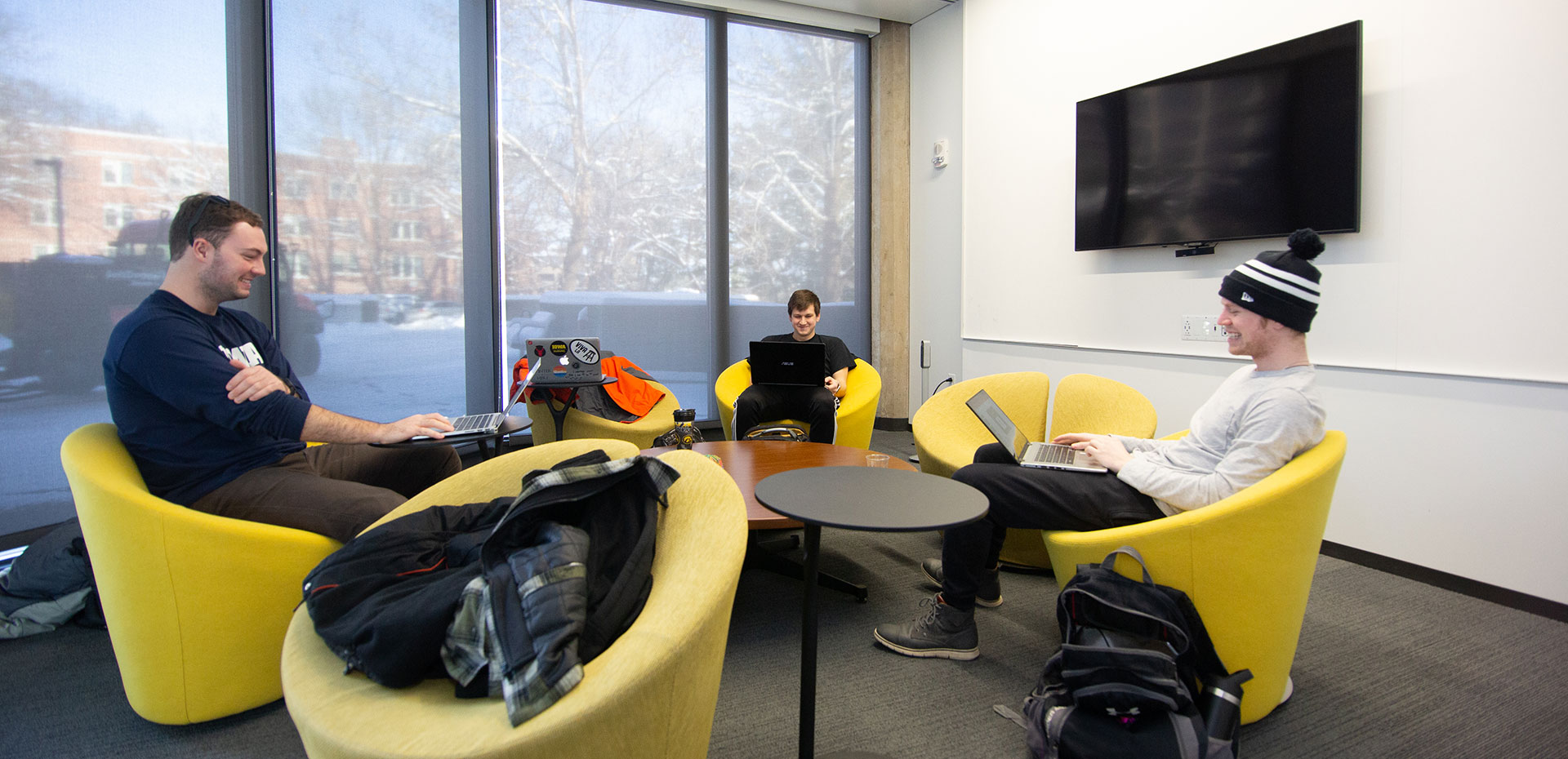 Students in the 130 Huddle room