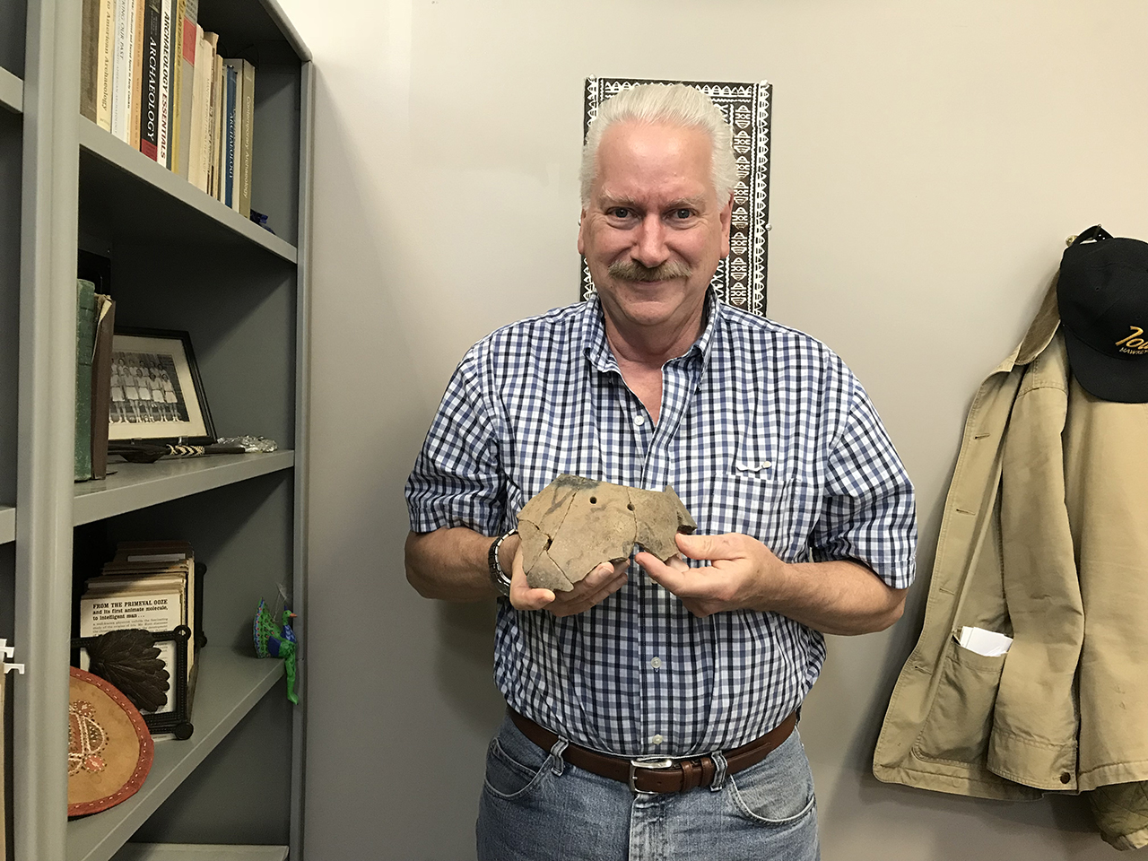 Joe Tiffany holding bison seed jar from Phipps sit